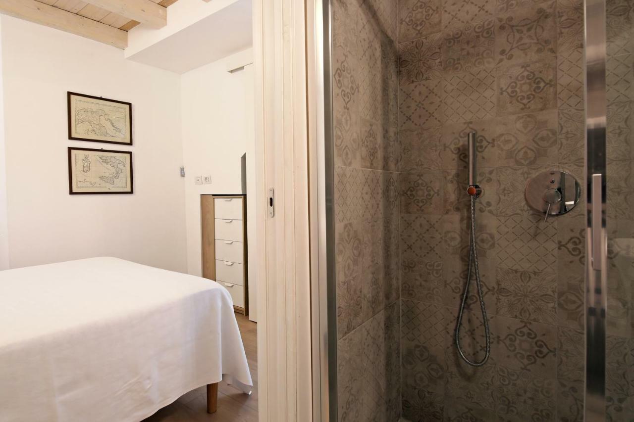 בלאג'יו Palazzo Barindelli Suite Bianca מראה חיצוני תמונה