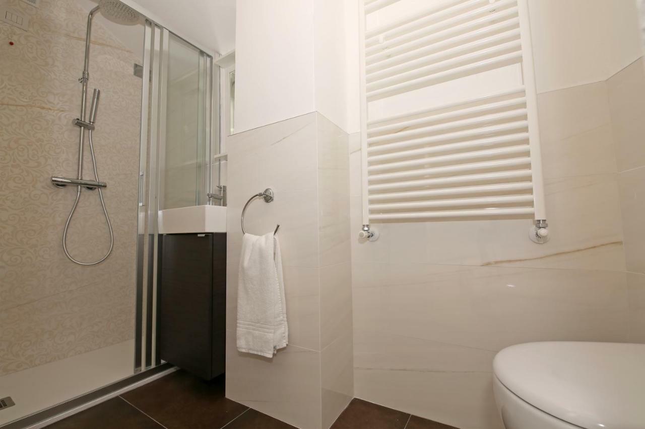 בלאג'יו Palazzo Barindelli Suite Bianca מראה חיצוני תמונה